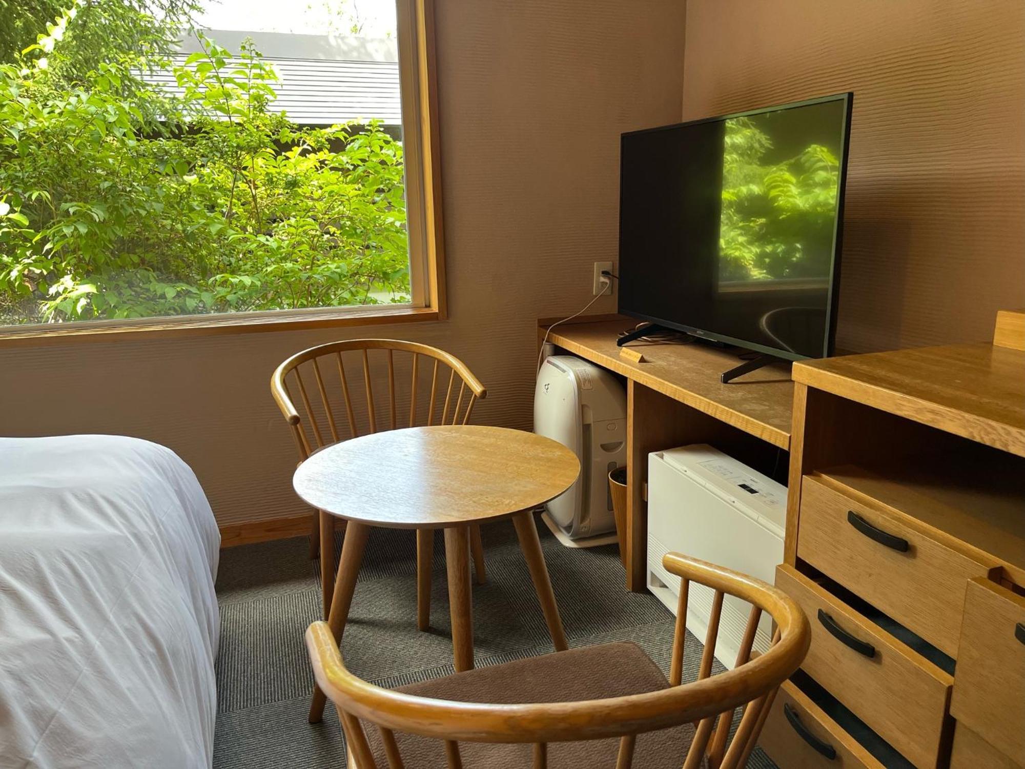 Miyama Ouan Kyoritsu Resort Такаяма Номер фото A room at the hotel